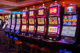 Asia Gaming live-dealer studio showing Dragon Tiger table with multi-camera broadcast and real-time betting interface